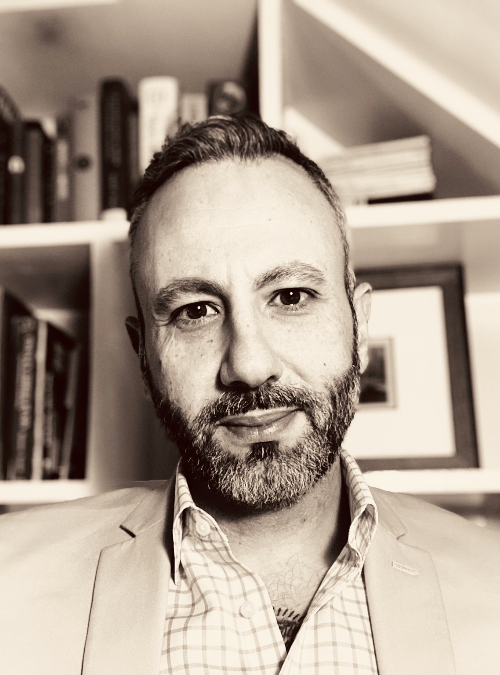 Headshot of Issam Zineh