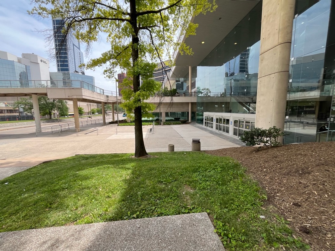 The photo is taken from West Pratt Street and so the Charles Street Lobby is down a slope and the sliding glass entrance doors are to the right.